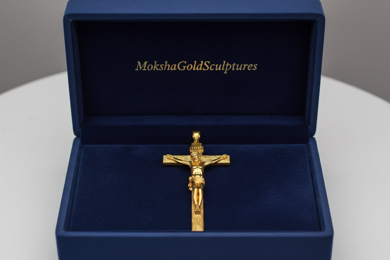 Crucifix Pendant in polished silver or brass by MokshaGoldSculptures, detailed Jesus on cross, shown in blue brand box.