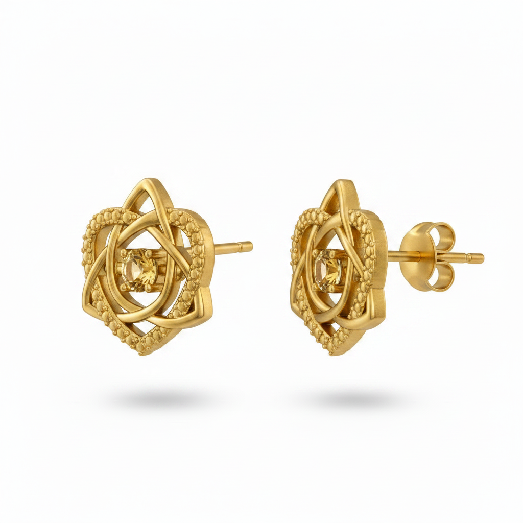 The Celtic Trinity Knot Heart Stud Earrings in 9K gold by MokshaGoldSculptures, with intricate Celtic detailing.