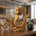 Golden Mermaid Statue in polished gold finish by MokshaGoldSculptures, shown on a modern desk with coastal accents.