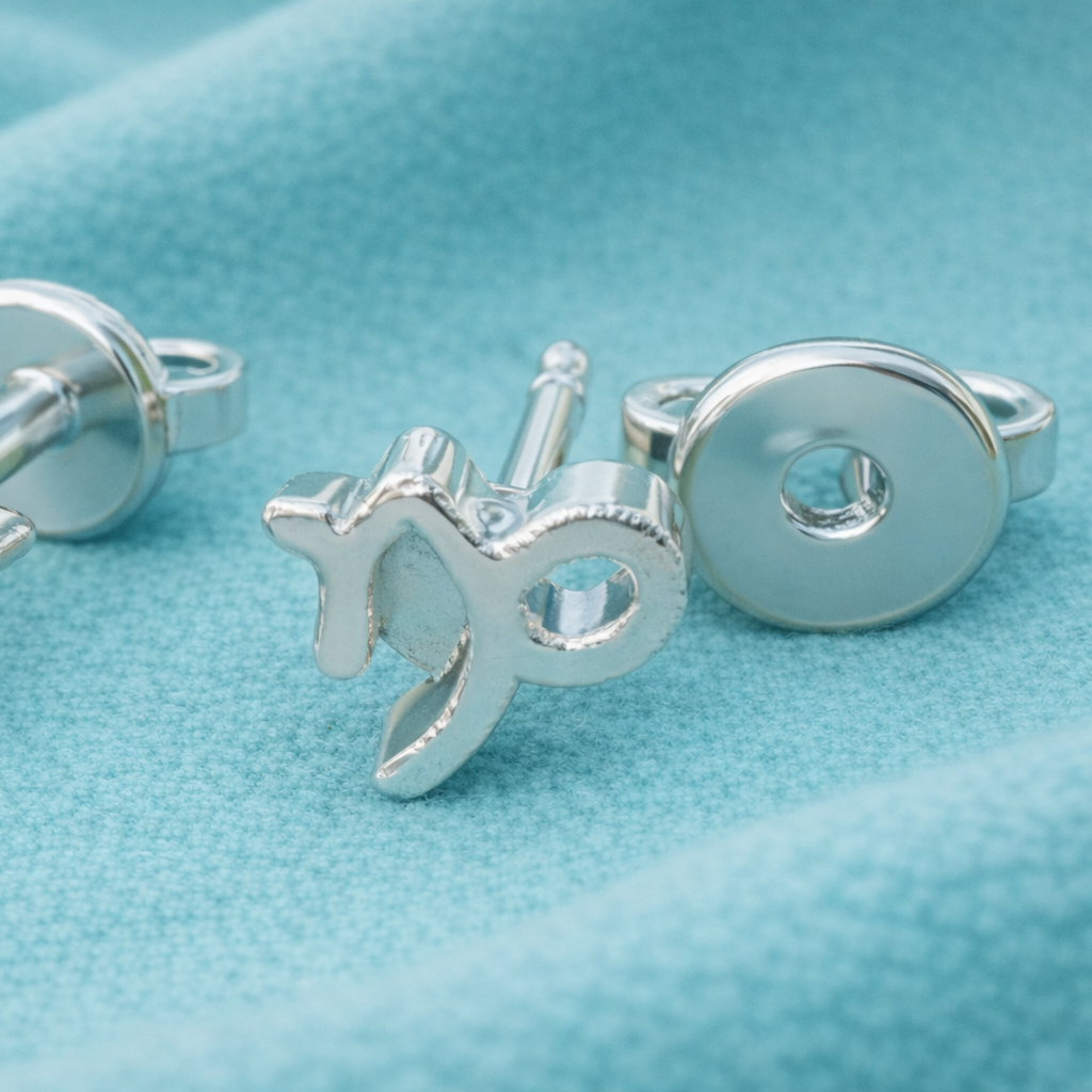 Capricorn Zodiac Symbol Stud Earrings in Silver or Polished Brass | Minimal Astrology Studs | 7 × 7 × 3 mm