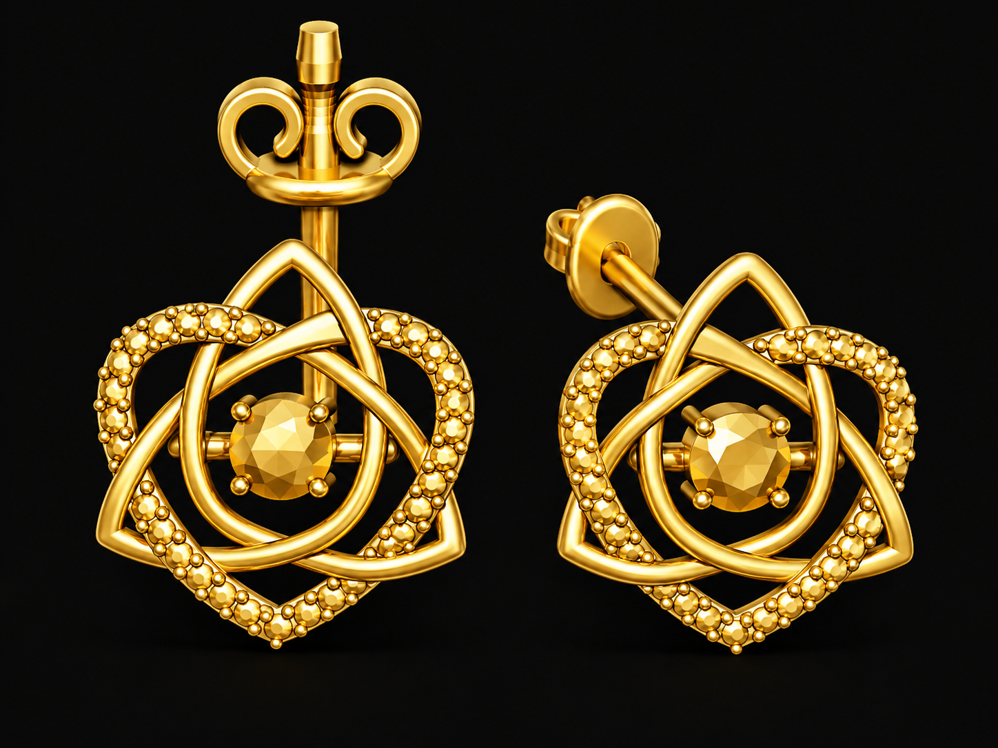 MokshaGoldSculptures Celtic Trinity Knot Heart Stud Earrings in 9K gold, silver, or brass with textured finish.