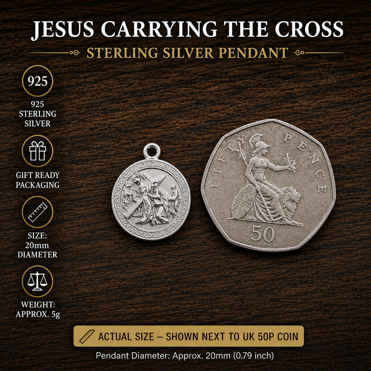 Jesus Carrying the Cross pendant in 925 sterling silver, MokshaGoldSculptures, shown beside a UK 50p coin for scale.