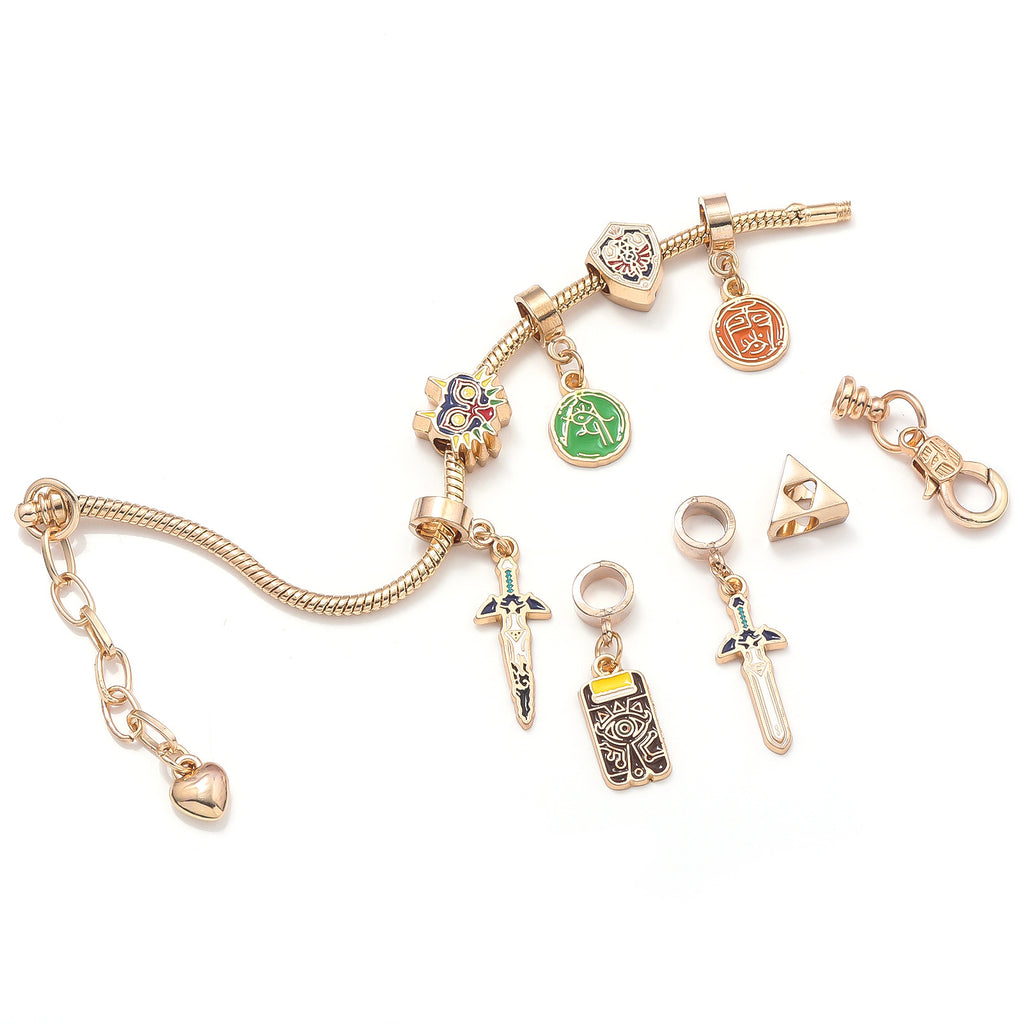 Legend of Zelda Charm Bracelet in silver finish by MokshaGoldSculptures, Breath of the Wild charms on white background.