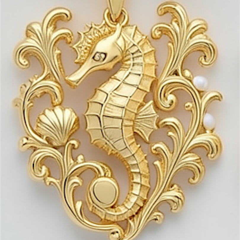 The Seahorse Pendant Necklace in gold finish by MokshaGoldSculptures, ornate seahorse with seashell and two pearls.