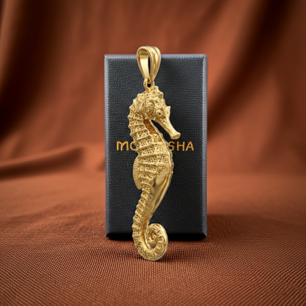 The Seahorse Pendant Necklace in gold, silver & brass by MokshaGoldSculptures, shown with elegant branded packaging.