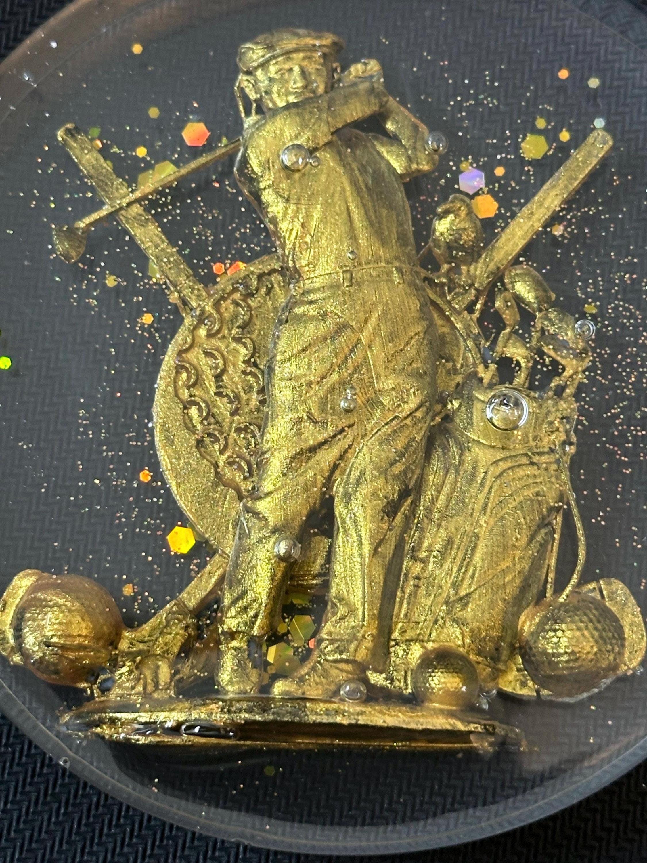 Golf trophy with golfer
