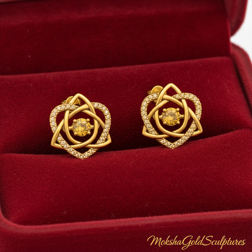 Celtic Trinity Knot Heart Stud Earrings in 9K gold by MokshaGoldSculptures, shown in red velvet box with logo.