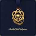The Celtic Trinity Knot Heart Emerald Pendant Necklace in 9K gold by MokshaGoldSculptures, gift box included.