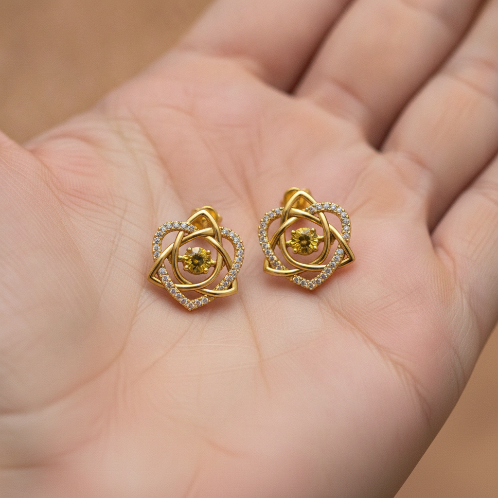 Celtic Trinity Knot Heart Stud Earrings in 9K gold & sterling silver by MokshaGoldSculptures, classic Irish knotwork design.