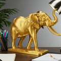 The Majestic Elephant Sculpture in gold PLA finish by MokshaGoldSculptures, luxury desk décor accessory.
