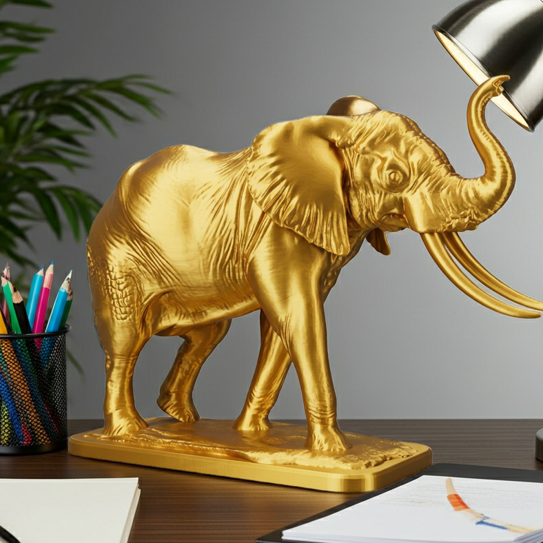 The Majestic Elephant Sculpture in gold PLA finish by MokshaGoldSculptures, luxury desk décor accessory.