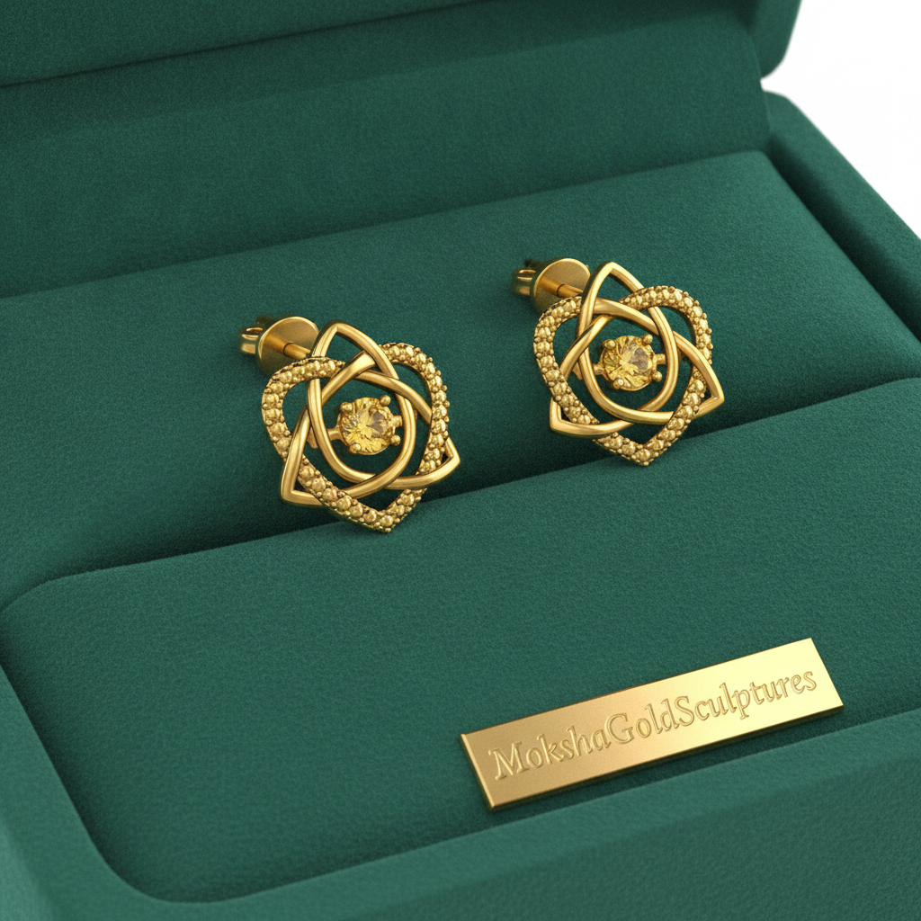 Celtic Trinity Knot Heart Stud Earrings in 9K gold by MokshaGoldSculptures, handcrafted Irish knot, shown in green box.