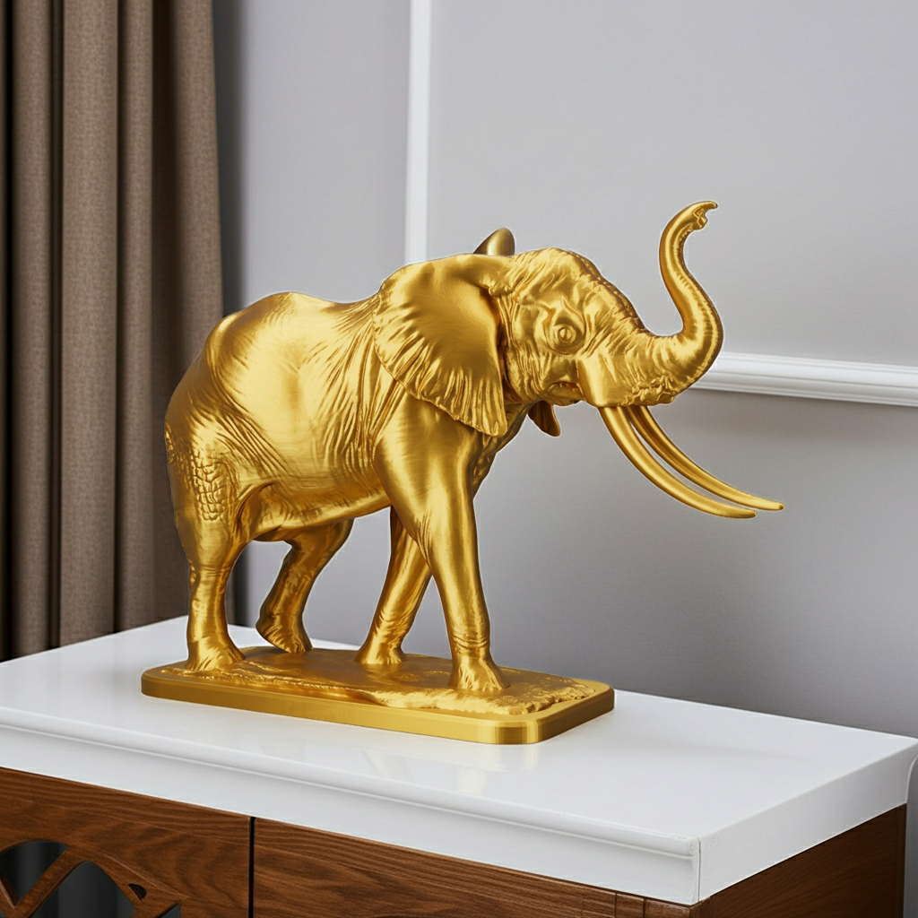 The Majestic Elephant Sculpture in gold PLA finish by MokshaGoldSculptures.