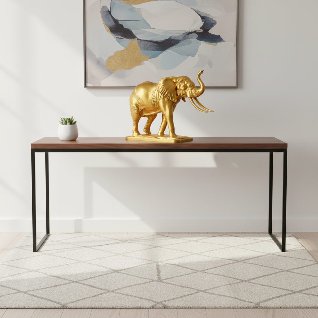Majestic Elephant Sculpture in gold PLA finish by MokshaGoldSculptures, displayed on a console table.