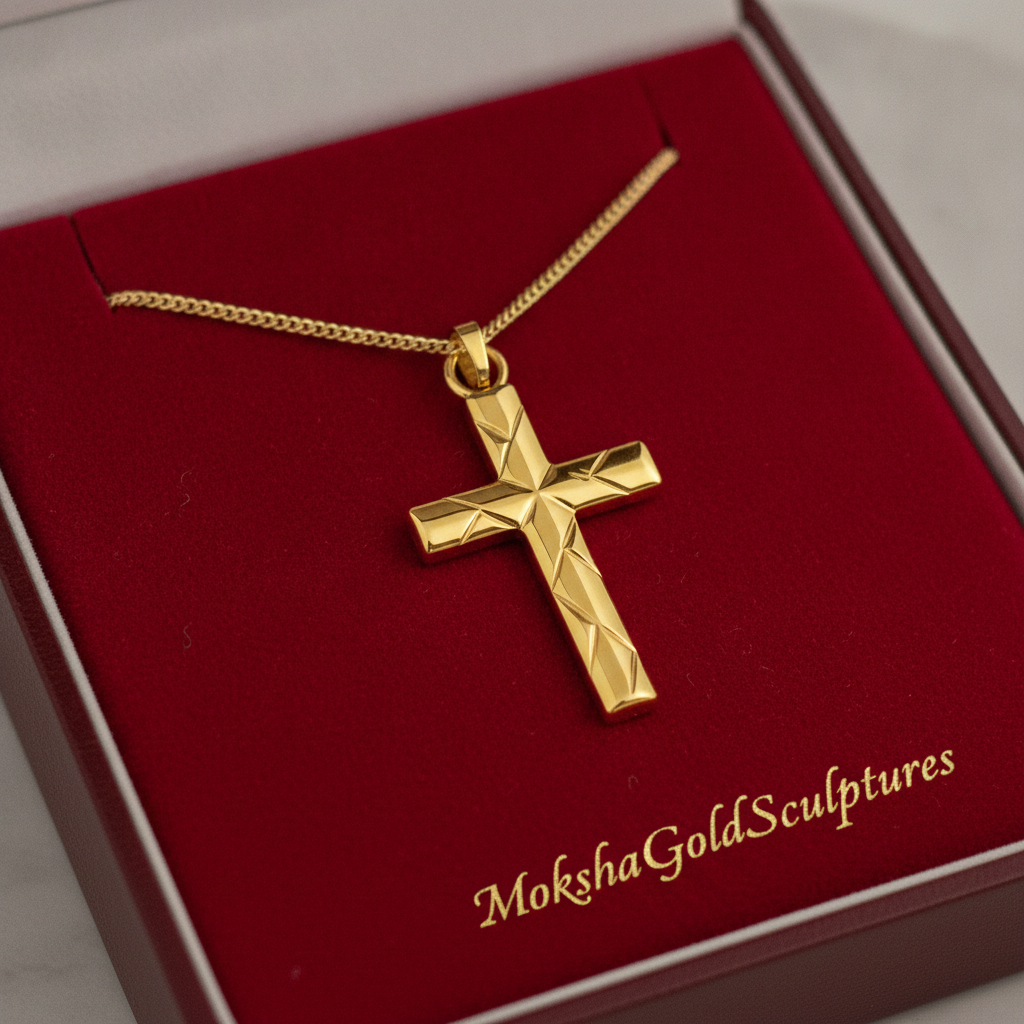 Faceted Cross Pendant Necklace in 9K gold, silver, or yellow brass by MokshaGoldSculptures in a red branded box.