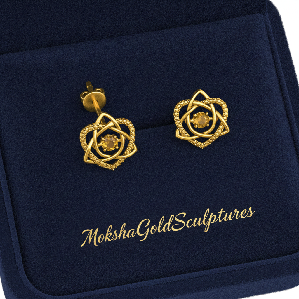 Celtic Trinity Knot Heart Stud Earrings in 9K gold by MokshaGoldSculptures, shown in branded box.