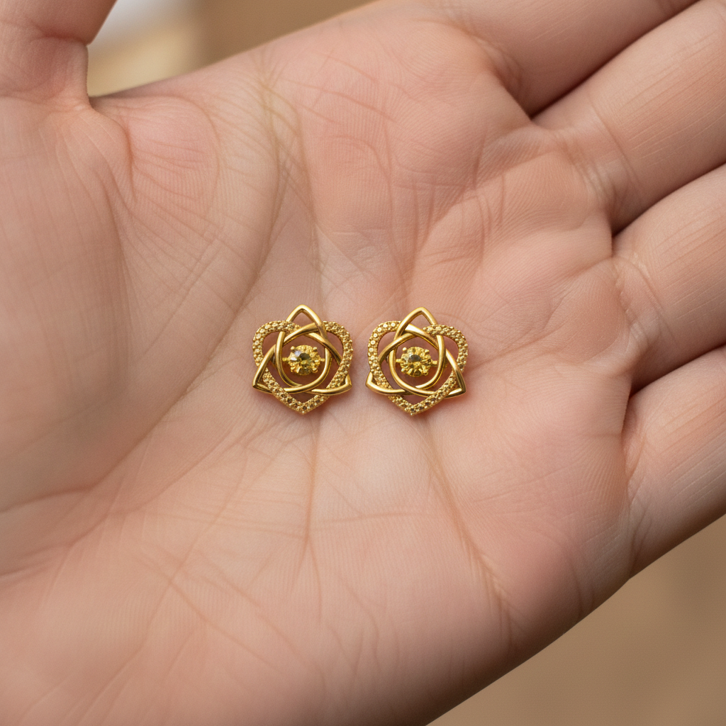 Celtic Trinity Knot Heart Stud Earrings in 9K gold by MokshaGoldSculptures.