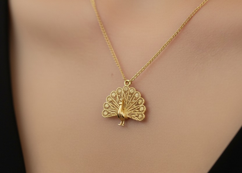 Peacock Pendant Necklace in 9K gold by MokshaGoldSculptures, peacock design with fanned tail on fine chain.