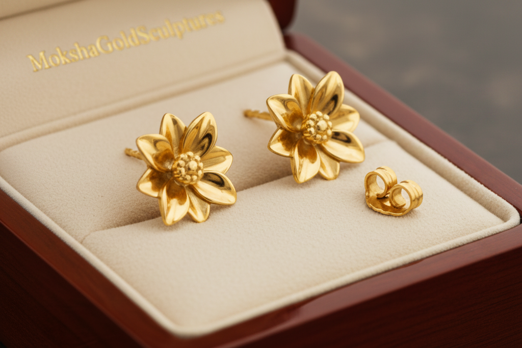 Polished Brass Flower Stud Earrings by MokshaGoldSculptures, floral design, high polish finish, shown in jewelry box.