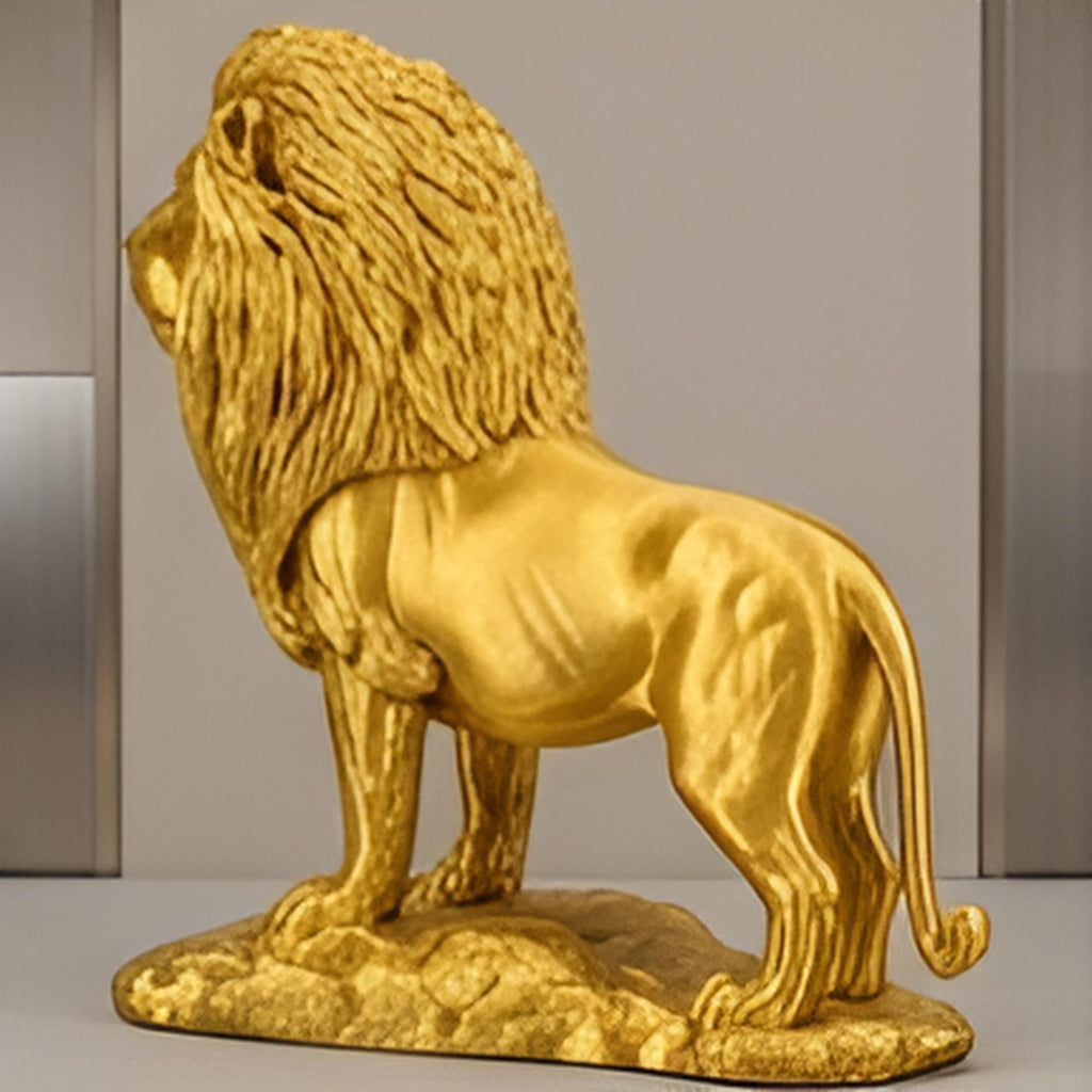 The Gold Lion Statue on Rock in metallic PLA finish by MokshaGoldSculptures, detailed mane and muscle, left-facing.