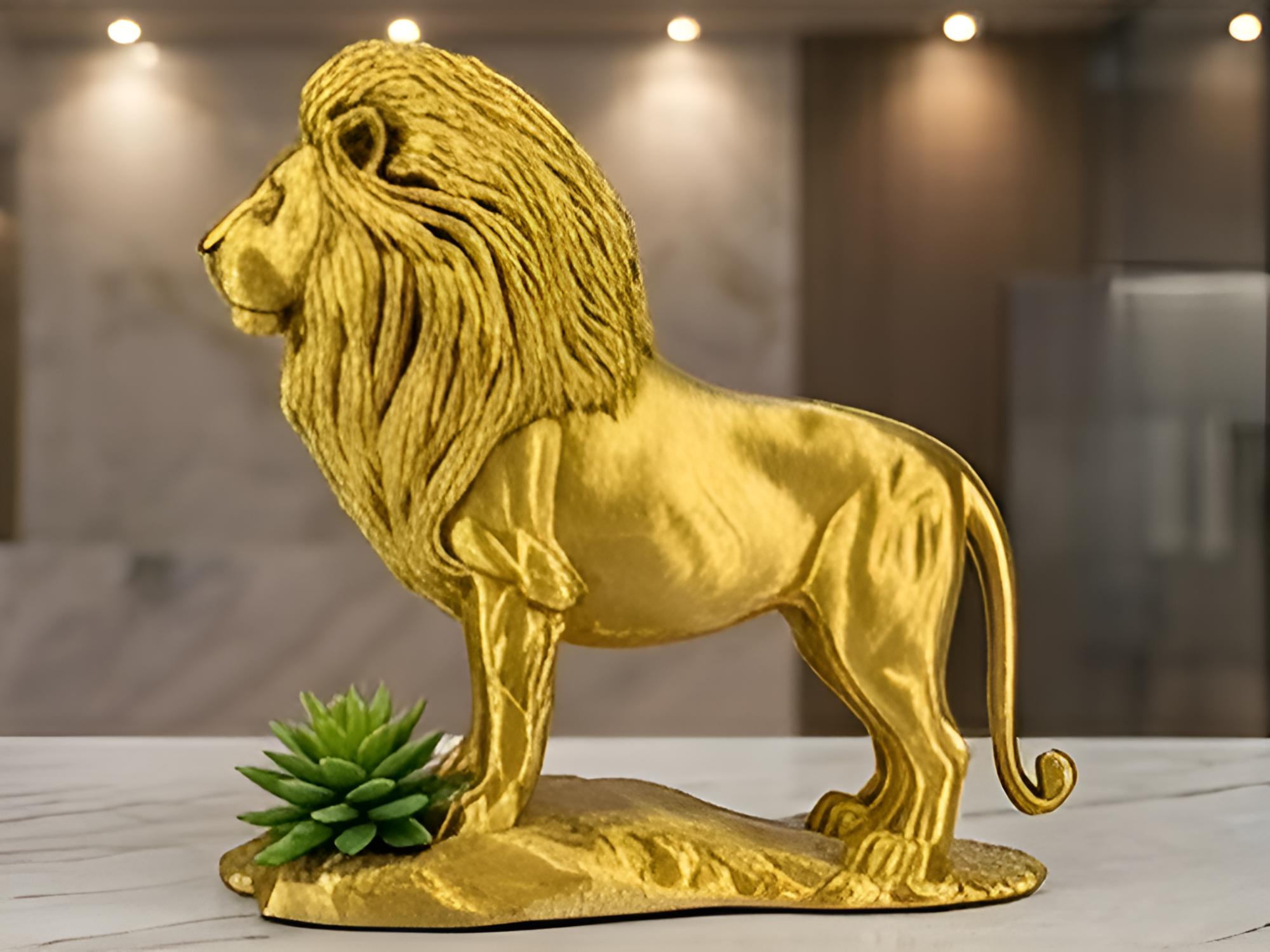 The Gold Lion Statue on Rock in metallic PLA finish by MokshaGoldSculptures.